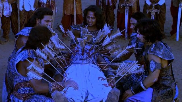 Bhishma rests on a bed of arrows