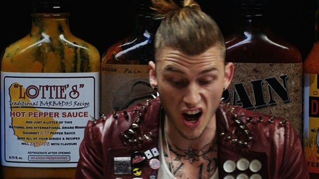 Machine Gun Kelly Talks Diddy, Hangovers, & Amber Rose While Eating Spicy Wings