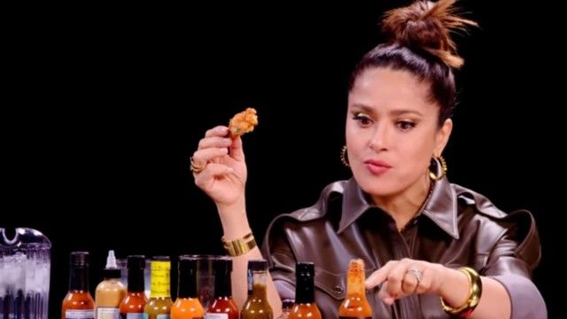 Salma Hayek Adopts Sean Evans While Eating Spicy Wings