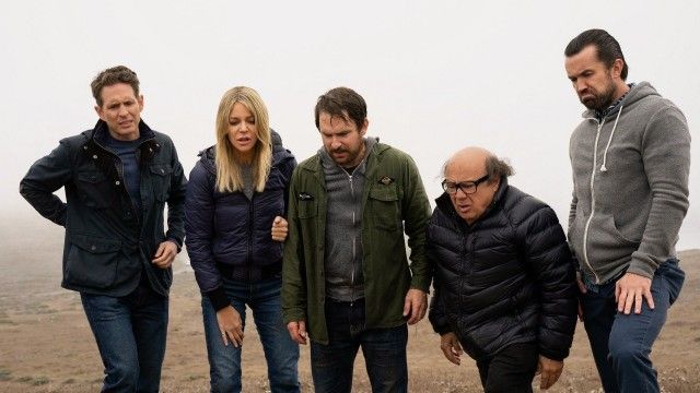 The Gang Carries A Corpse Up A Mountain