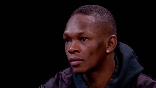 Israel Adesanya Gives Thanks While Eating Spicy Wings